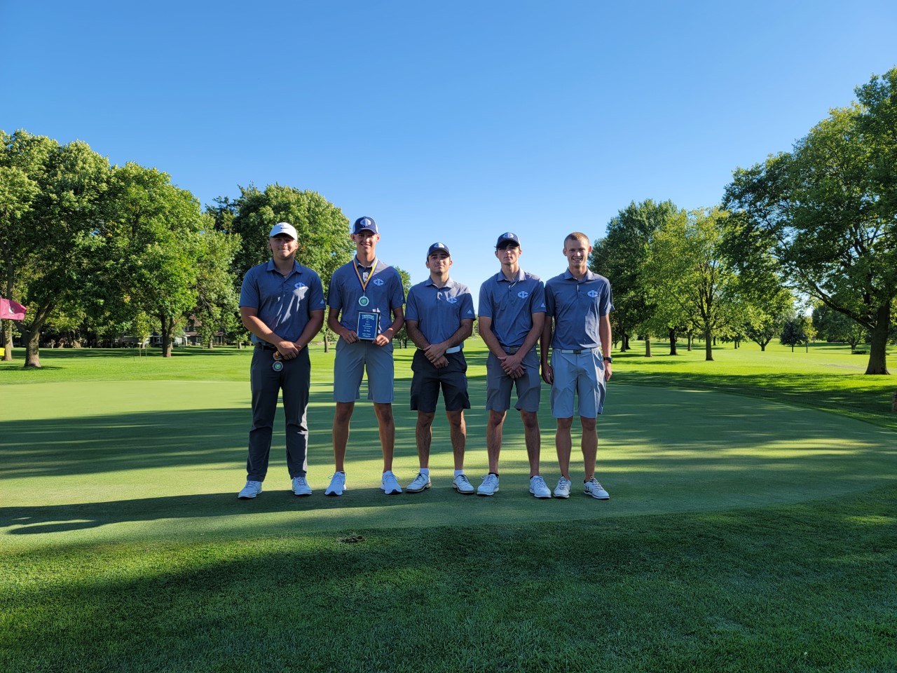 Tritons go low again, claim NIACC title