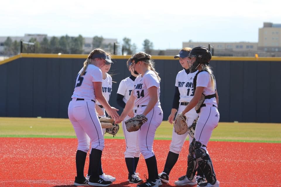 Loghen Schnetzer (No. 13) is the starting first baseman for the Triton softball team.