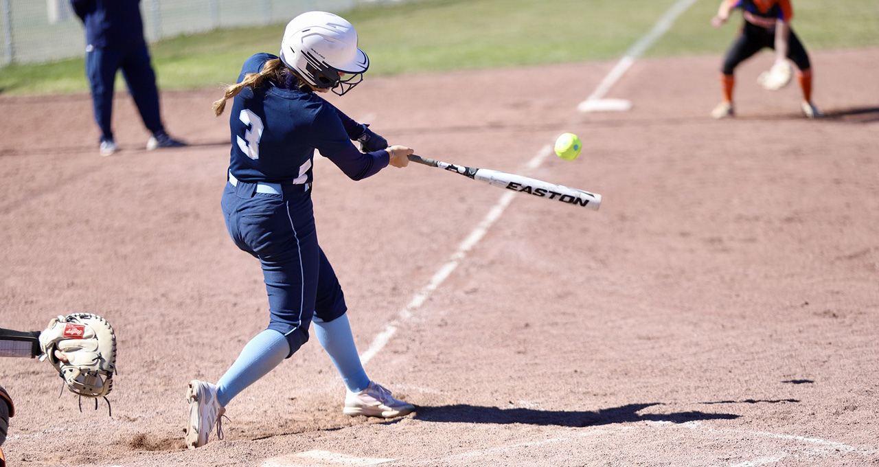 Breanna Nolte hits for the Tritons. She had 3 hits vs. Iowa Lakes 