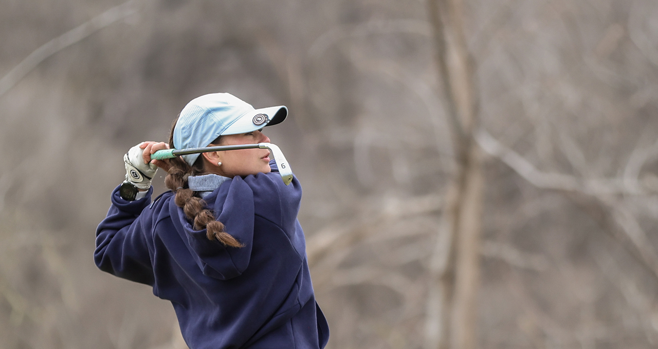 Female Golf Athlete Swinging Club