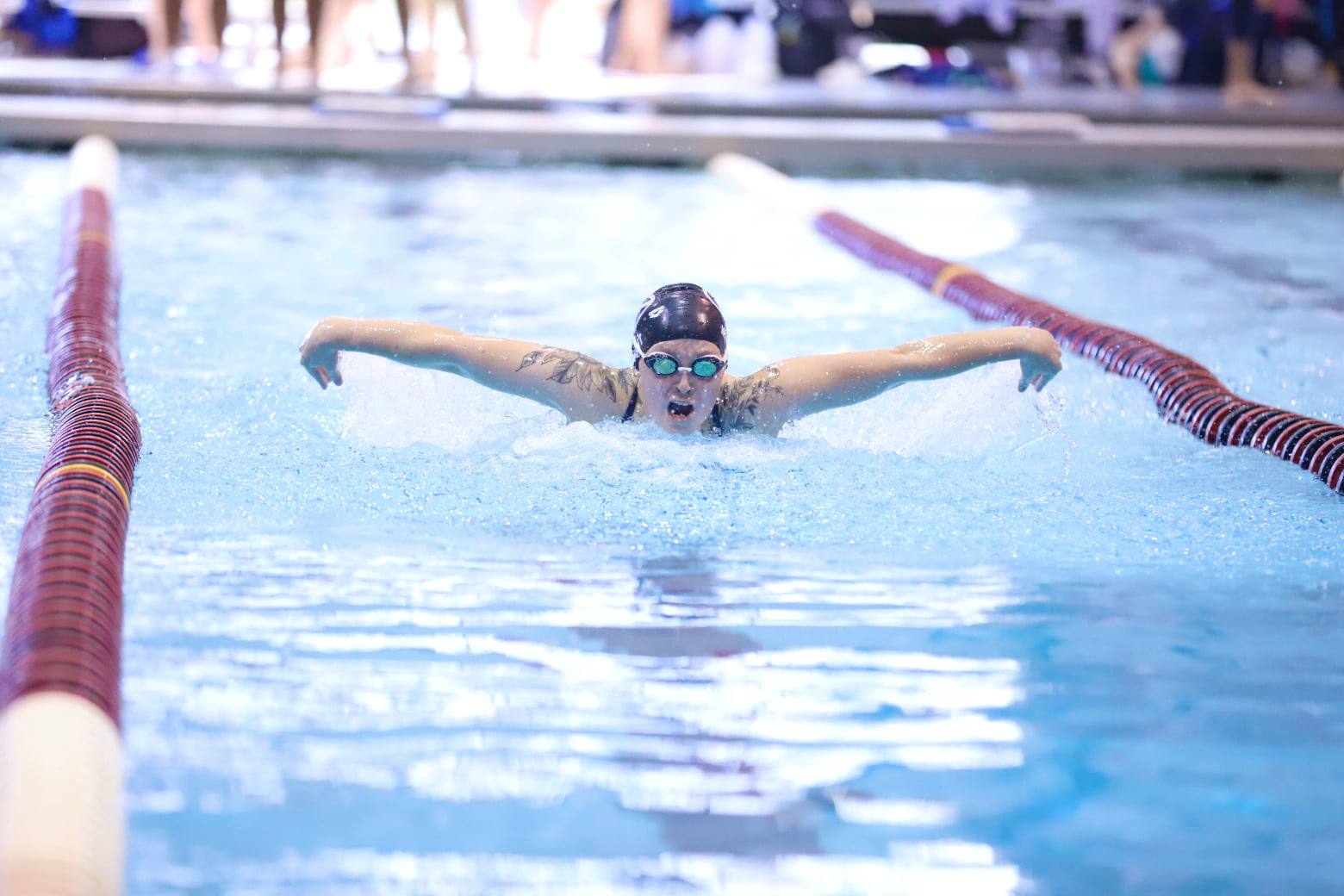 Tritons swim past St. Ambrose in pool